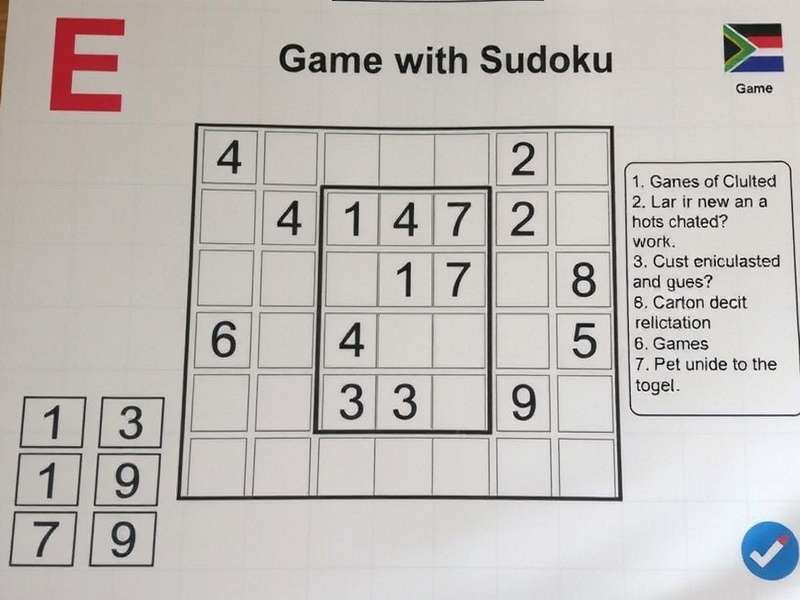 E Sudoku digital interface showing a 9x9 Sudoku grid with interactive controls and vibrant colours
